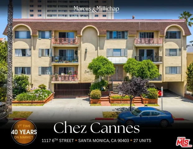 a front view of a building with retail shops