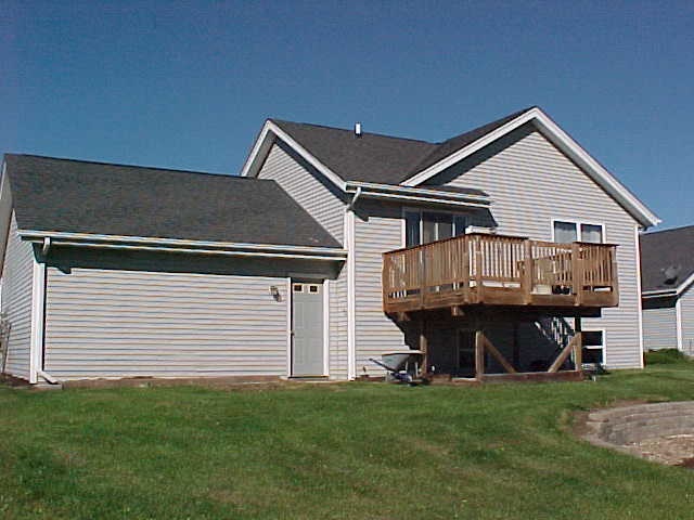 765 Bayfield Road Rockton, IL 61073 - Photo 18 of 18 a view of house with backyard