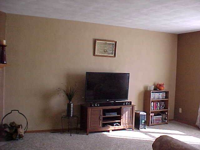 765 Bayfield Road Rockton, IL 61073 - Photo 4 of 18 a living room with furniture and a flat screen tv