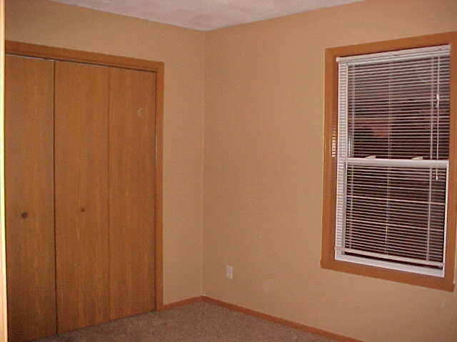 765 Bayfield Road Rockton, IL 61073 - Photo 10 of 18 a view of a room that has a window in it