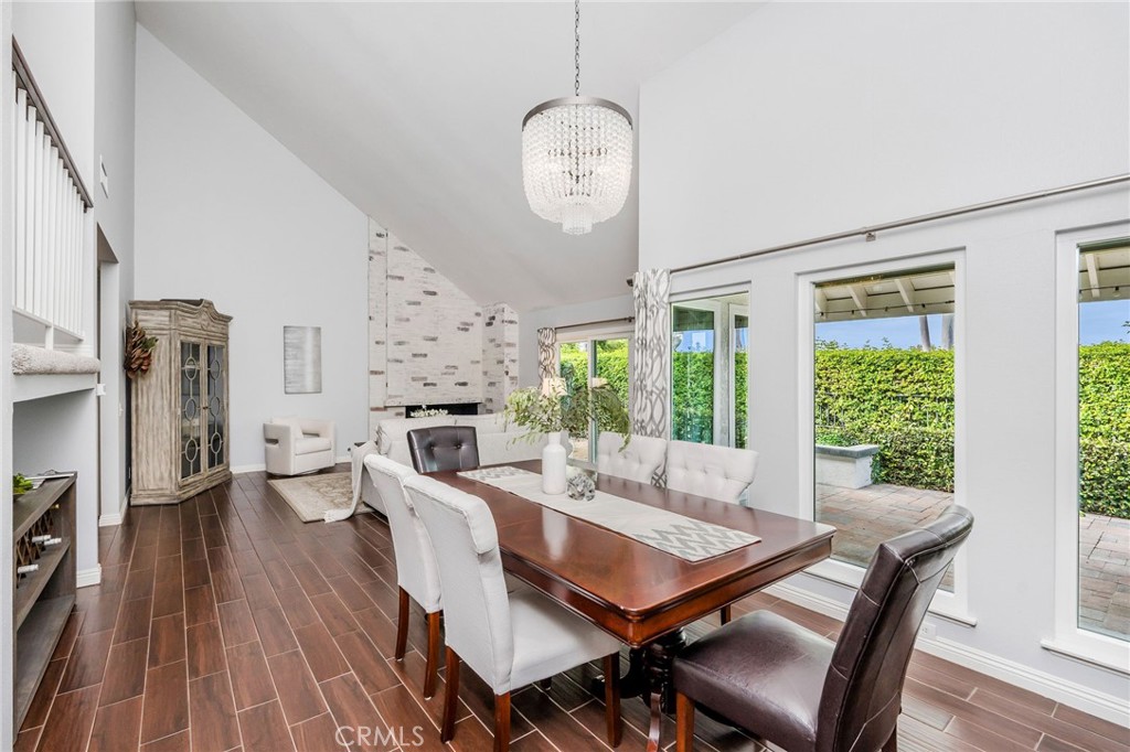 30392 North Hampton Road Laguna Niguel, CA 92677 - Photo 11 of 44 a view of a dining room with furniture window and wooden floor