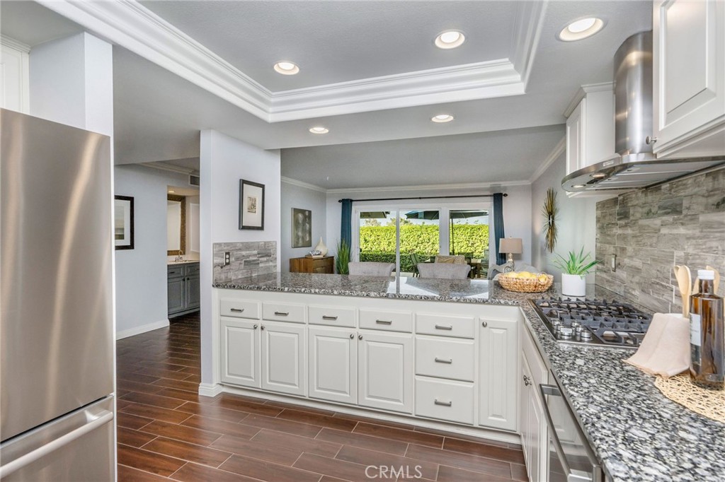 30392 North Hampton Road Laguna Niguel, CA 92677 - Photo 19 of 44 a spacious bathroom with a granite countertop sink a mirror and a shower