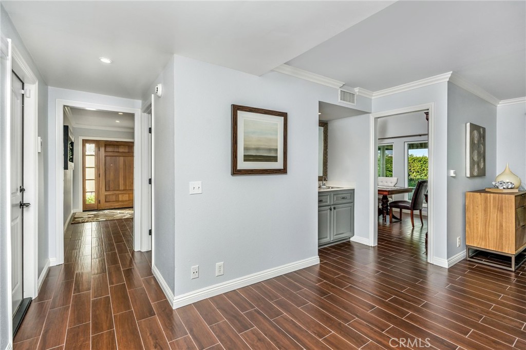 30392 North Hampton Road Laguna Niguel, CA 92677 - Photo 20 of 44 a view of a living room and dining room with wooden floor