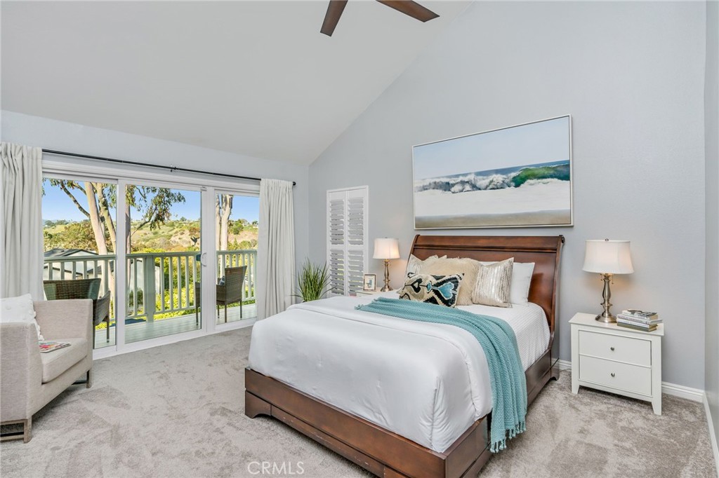 30392 North Hampton Road Laguna Niguel, CA 92677 - Photo 25 of 44 a bedroom with a large bed and a tv on table