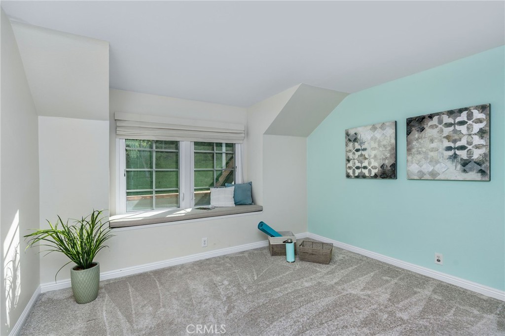 30392 North Hampton Road Laguna Niguel, CA 92677 - Photo 34 of 44 a view of an empty room with a window and table chair