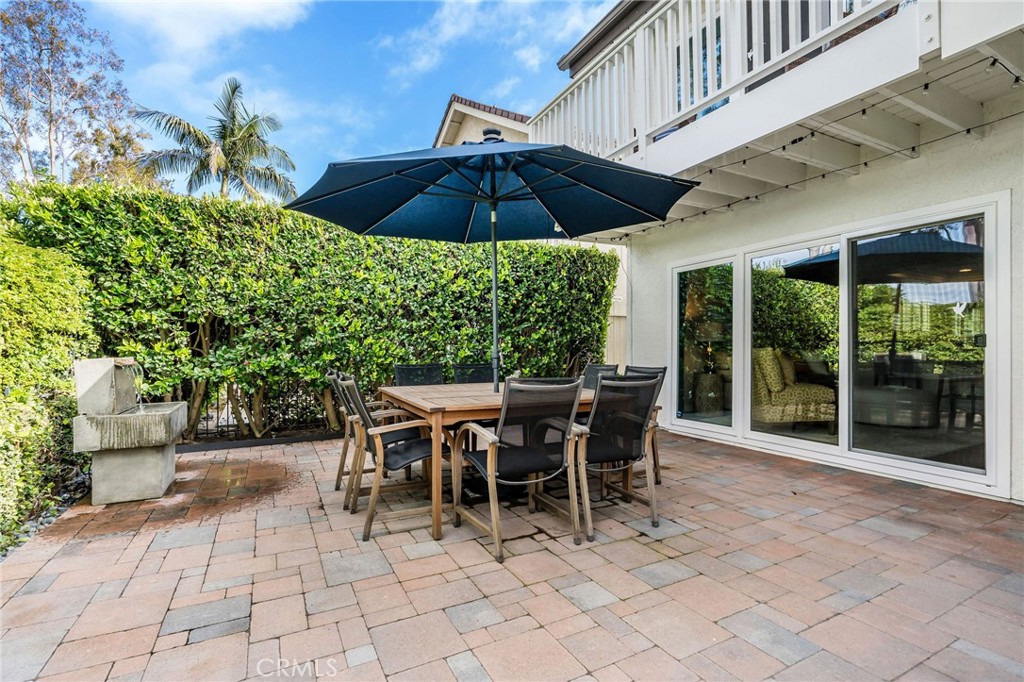 30392 North Hampton Road Laguna Niguel, CA 92677 - Photo 41 of 44 a patio with table and chairs