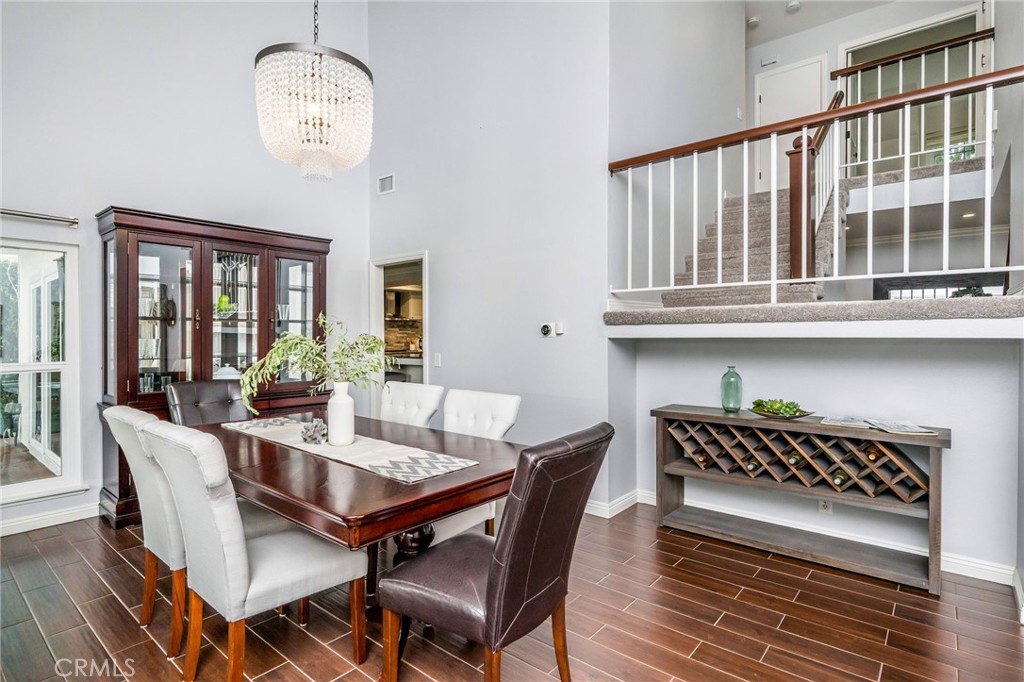 30392 North Hampton Road Laguna Niguel, CA 92677 - Photo 10 of 44 a view of a dining room with furniture window and wooden floor