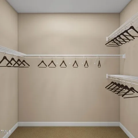 a bathroom with a shower sink and mirror