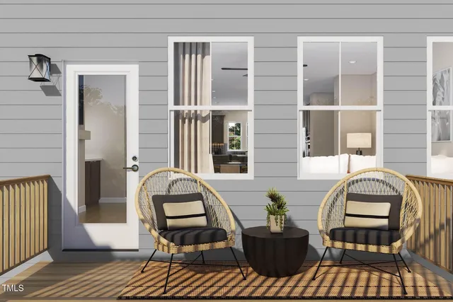 a kitchen with stainless steel appliances kitchen island granite countertop a table chairs and a refrigerator