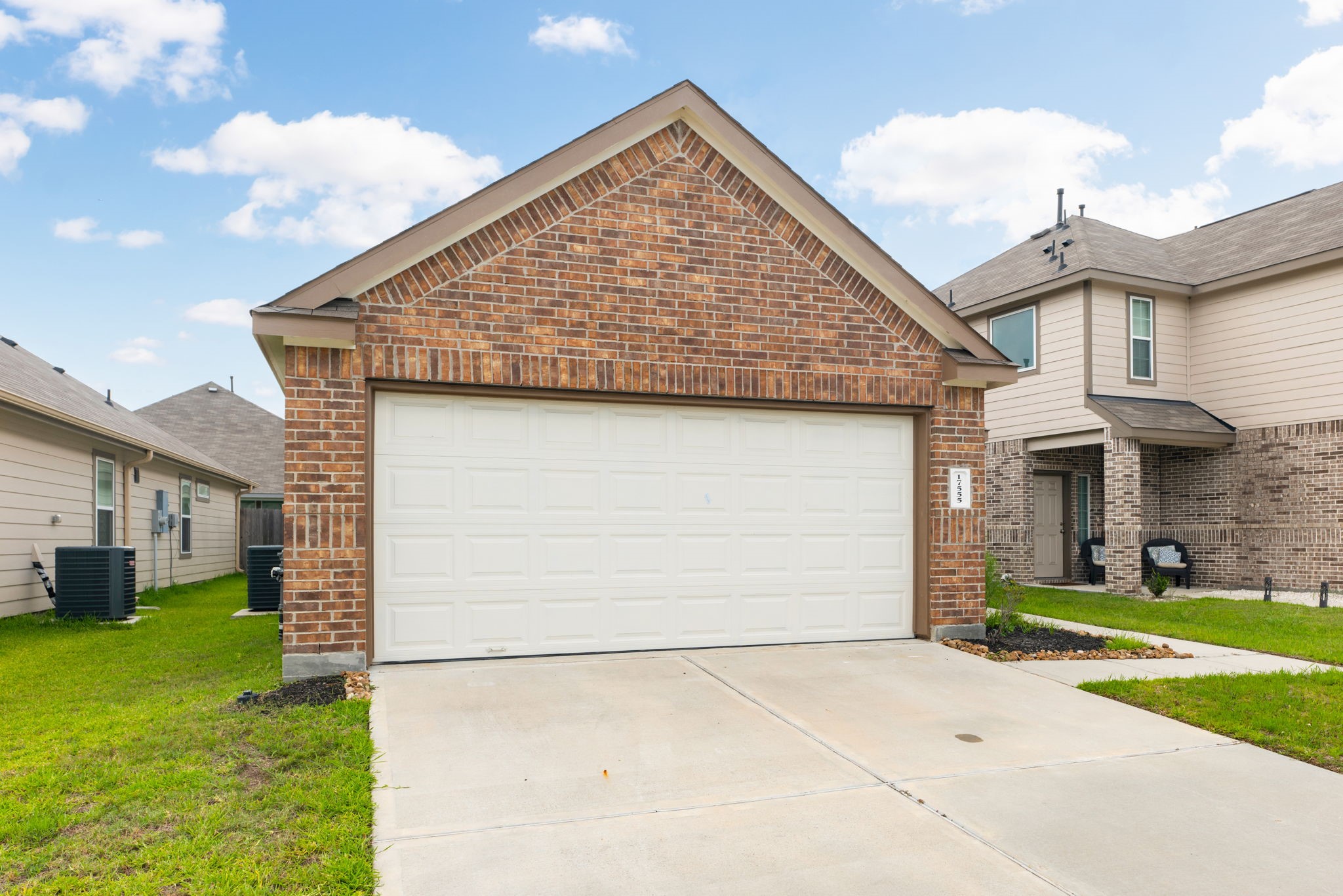 17555 Greystanes Road Humble, TX 77346 - Photo 27 of 28 a view of a house with a yard