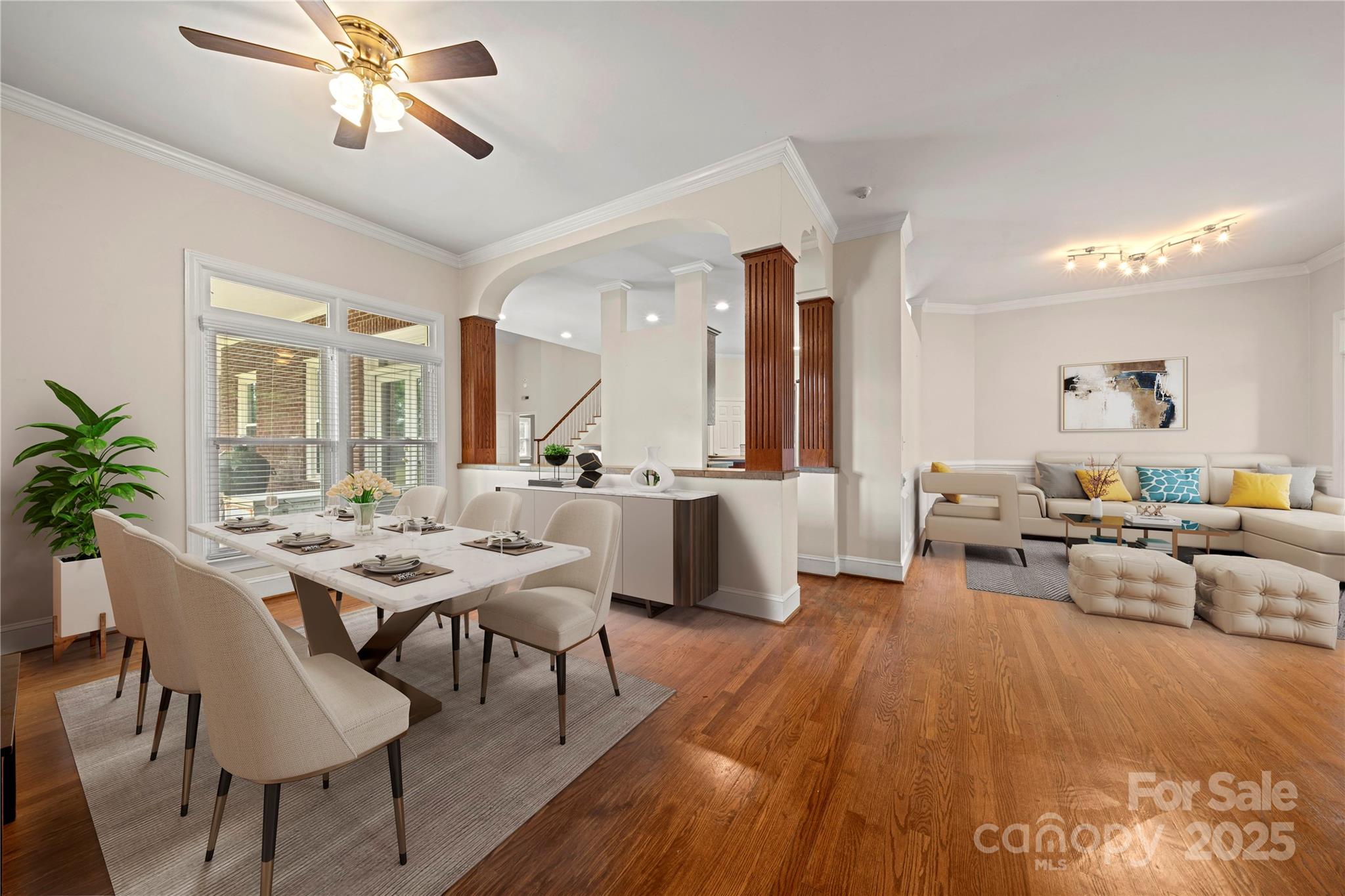 6218 Indian Trail Fairview Road Indian Trail, NC 28079 - Photo 20 of 46 a living room with furniture kitchen view and a wooden floor