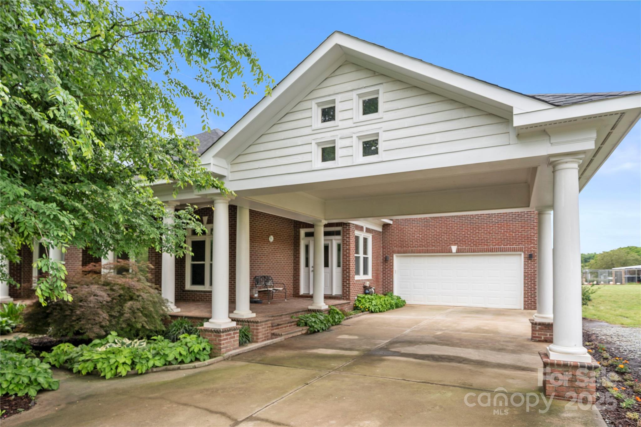 6218 Indian Trail Fairview Road Indian Trail, NC 28079 - Photo 2 of 46 a view of a white house