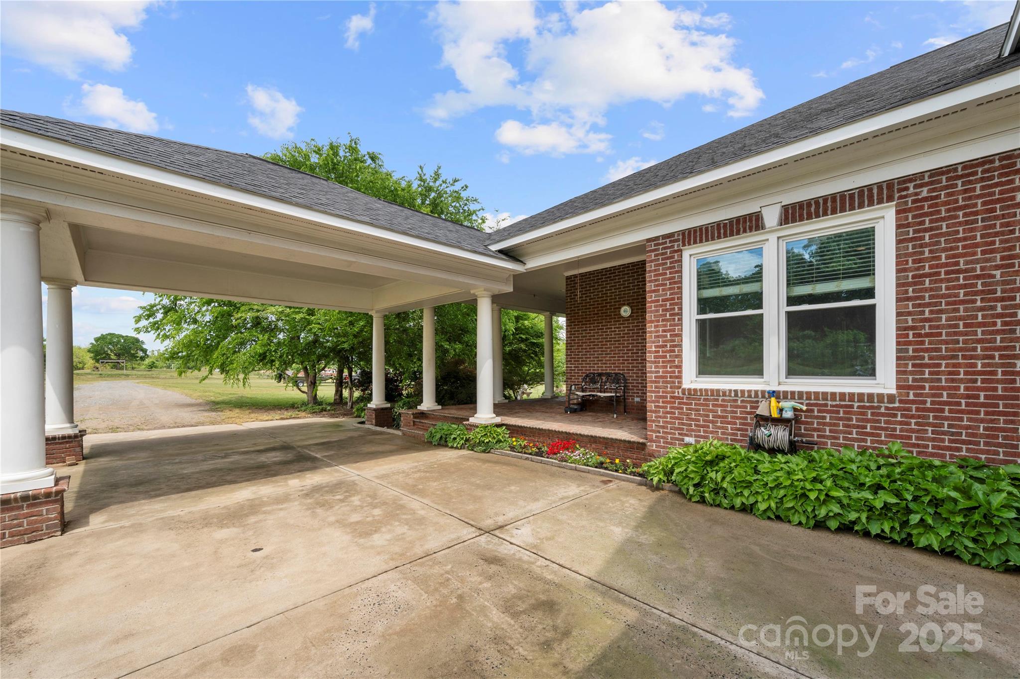 6218 Indian Trail Fairview Road Indian Trail, NC 28079 - Photo 32 of 46 a house with a yard