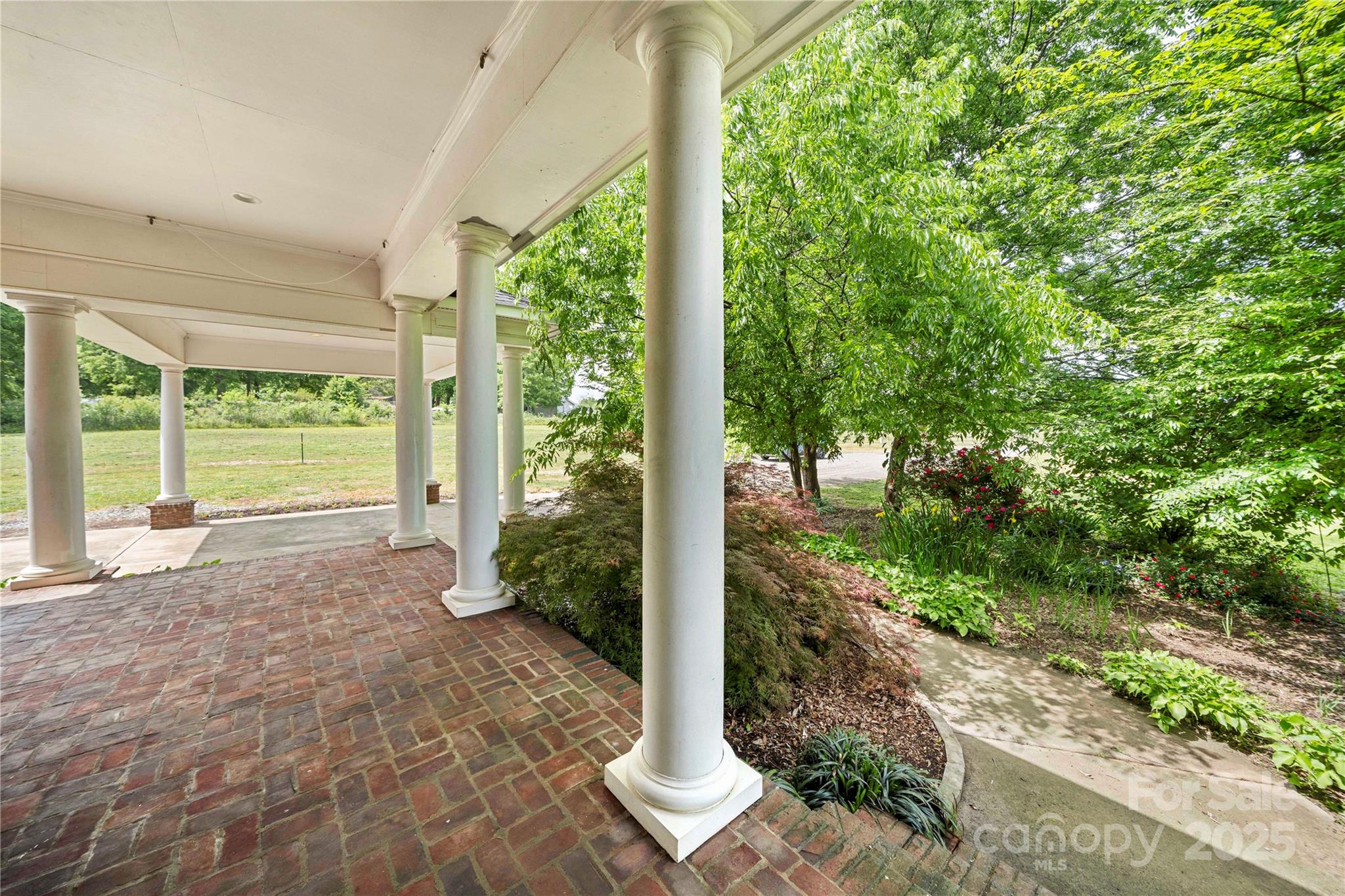 6218 Indian Trail Fairview Road Indian Trail, NC 28079 - Photo 35 of 46 a view of a garden with plants