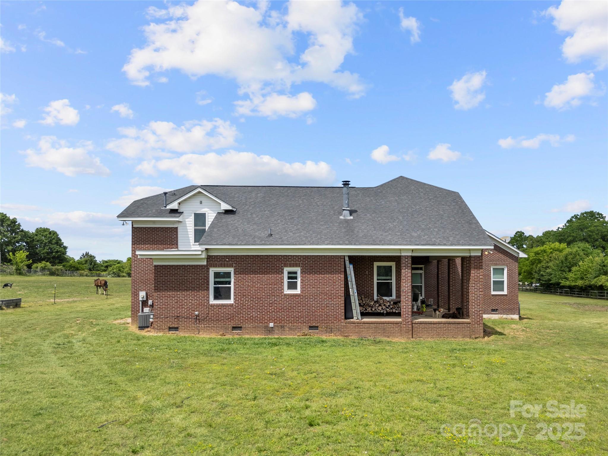 6218 Indian Trail Fairview Road Indian Trail, NC 28079 - Photo 38 of 46 a front view of a house with a garden
