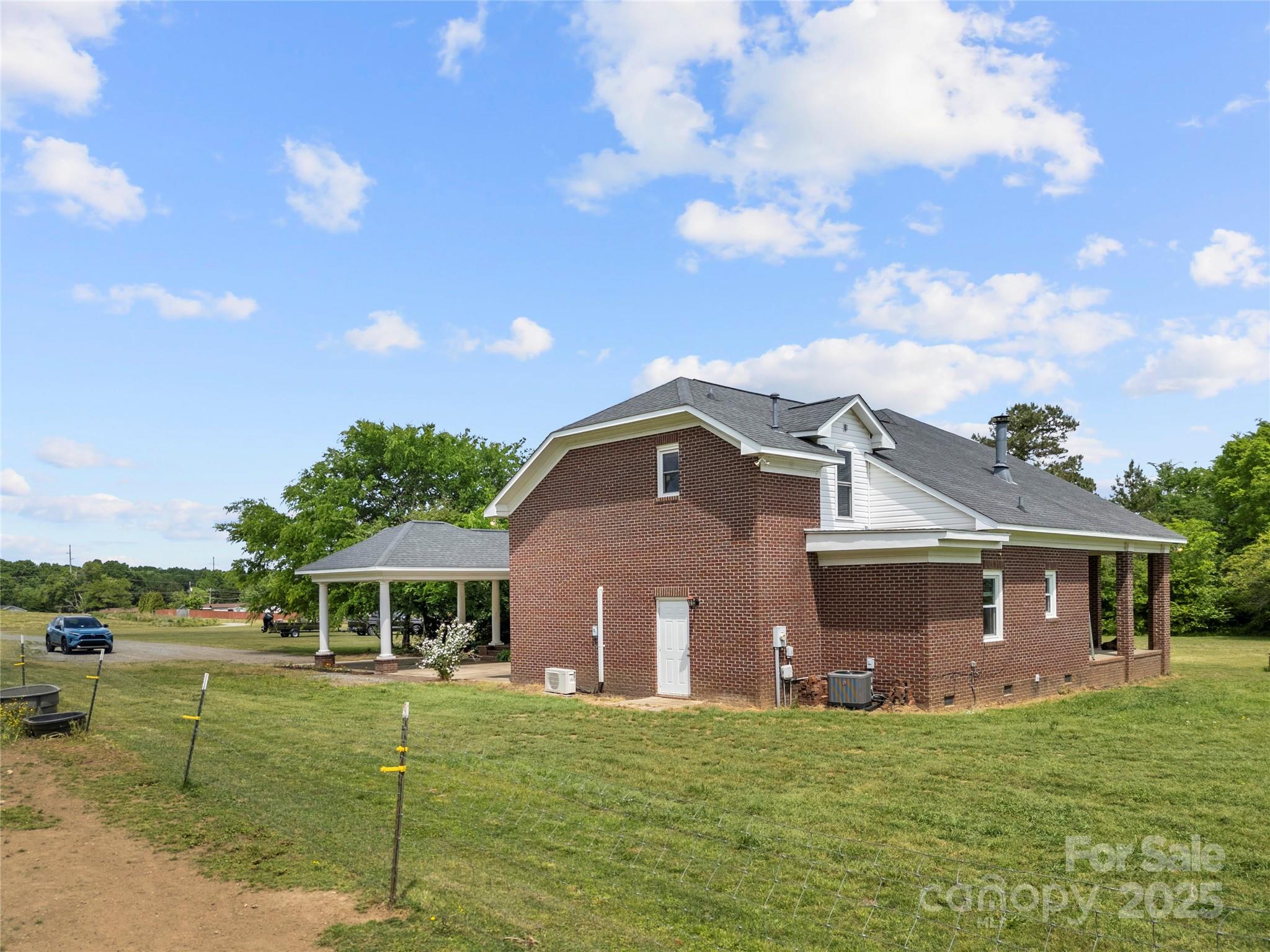 6218 Indian Trail Fairview Road Indian Trail, NC 28079 - Photo 39 of 46 a front view of a house with a garden