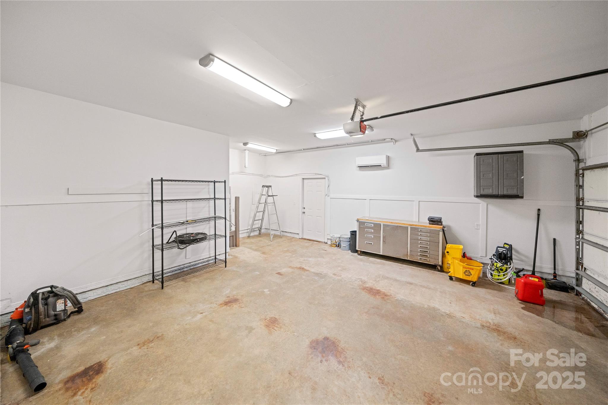 6218 Indian Trail Fairview Road Indian Trail, NC 28079 - Photo 43 of 46 a view of a livingroom with furniture and a flat screen tv