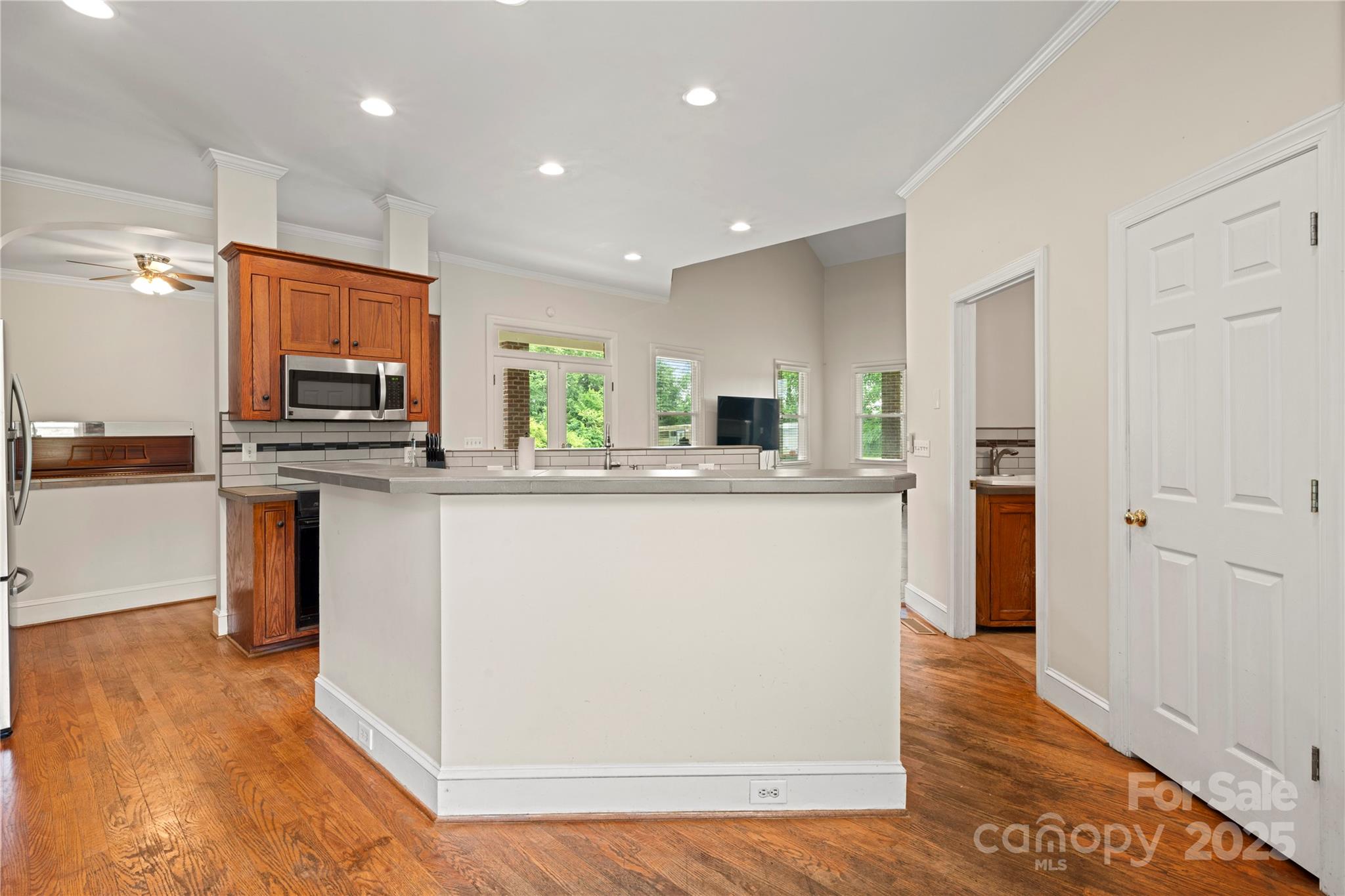 6218 Indian Trail Fairview Road Indian Trail, NC 28079 - Photo 6 of 46 a kitchen with stainless steel appliances granite countertop a refrigerator stove top oven and sink
