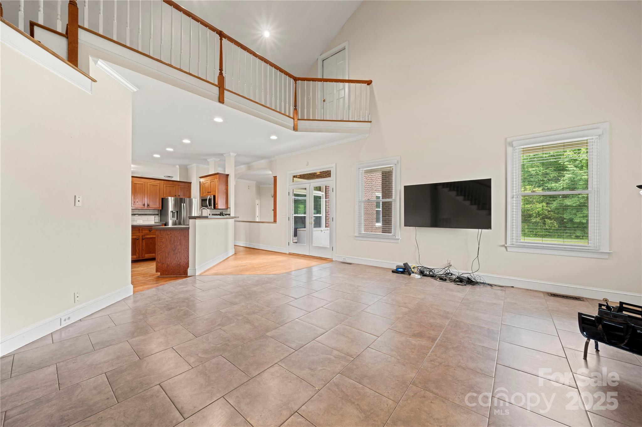 6218 Indian Trail Fairview Road Indian Trail, NC 28079 - Photo 9 of 46 a view of an empty room with kitchen and windows