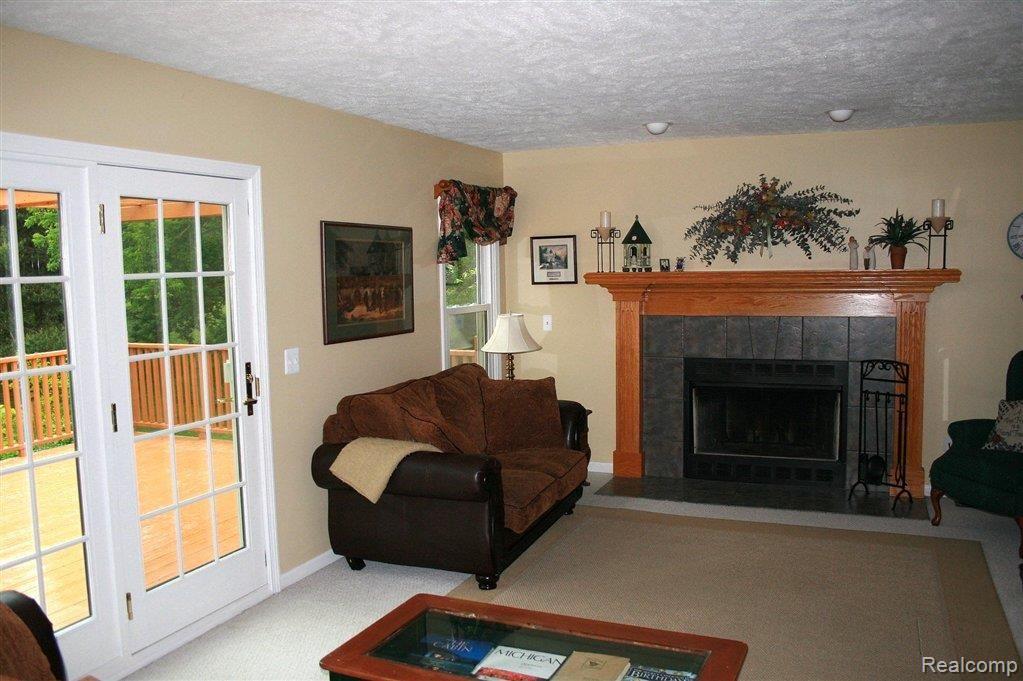3021 Brewer Road Howell, MI 48855 - Photo 15 of 23 Great Room w fireplace