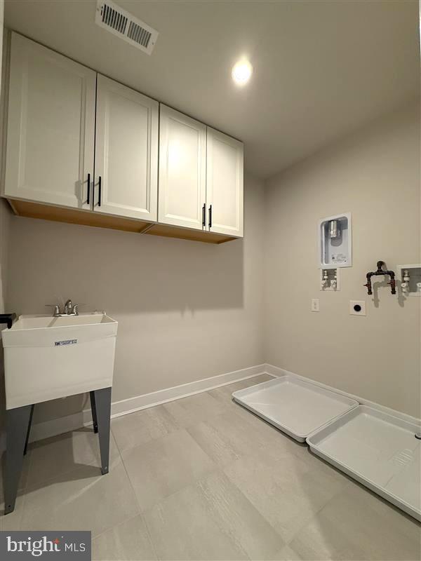 14566 Workman Circle Milton, DE 19968 - Photo 12 of 15 a view of a kitchen with a sink and cabinets