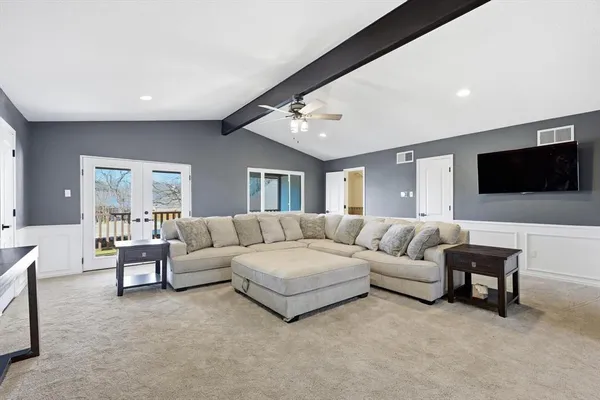 a close view of a utility room with dryer and washer