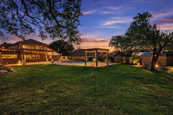a outdoor living space with patio furniture and a potted plant