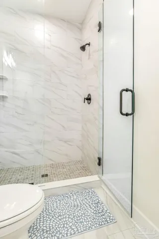 a bathroom with a toilet and a sink