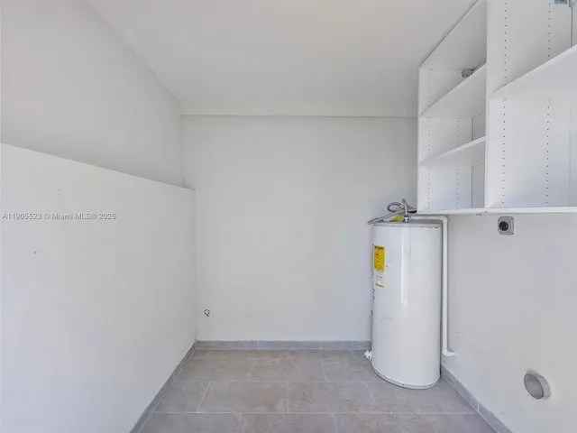 a view of a storage & utility room with closet
