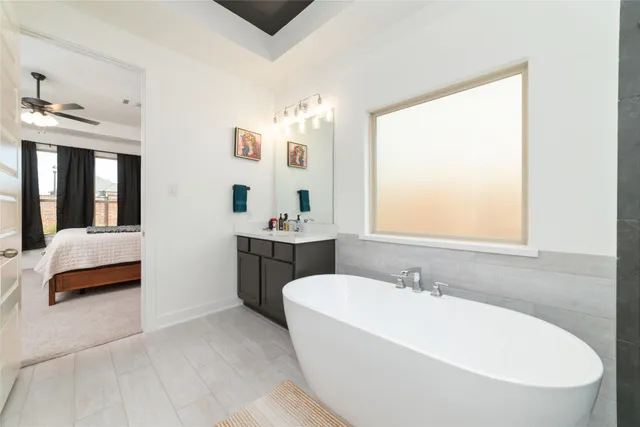 a view of living room with furniture and a fireplace