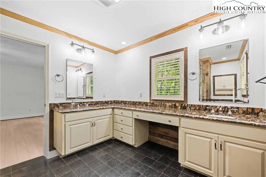 955 Dogwood Boone, NC 28607 - Photo 20 of 48 a kitchen with stainless steel appliances granite countertop a stove and a sink