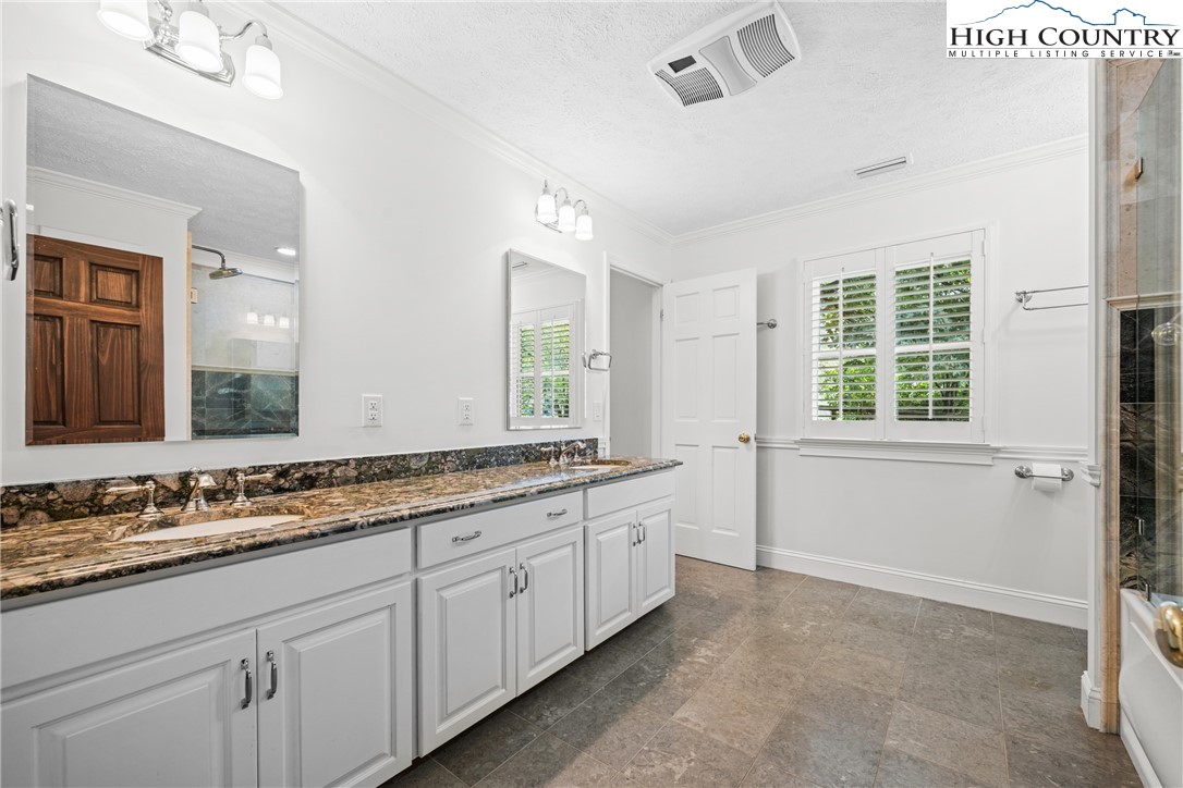 955 Dogwood Boone, NC 28607 - Photo 22 of 48 a bathroom with a sink and a window