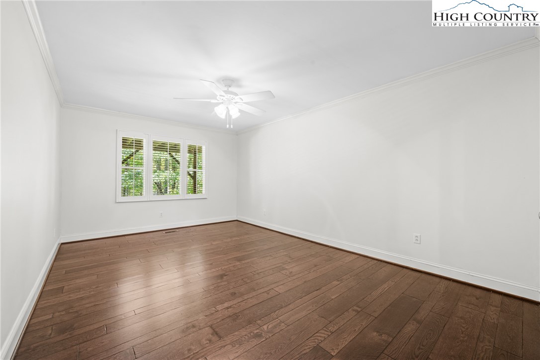 955 Dogwood Boone, NC 28607 - Photo 32 of 48 an empty room with wooden floor and window