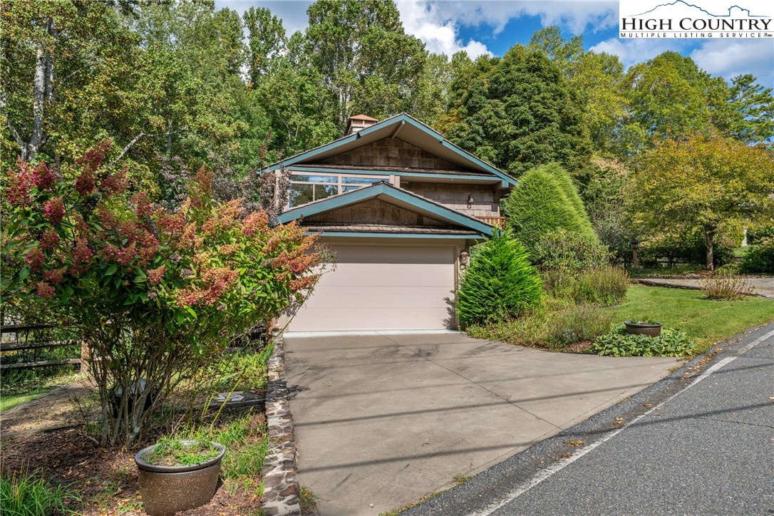 955 Dogwood Boone, NC 28607 - Photo 37 of 48 a front view of a house with garden