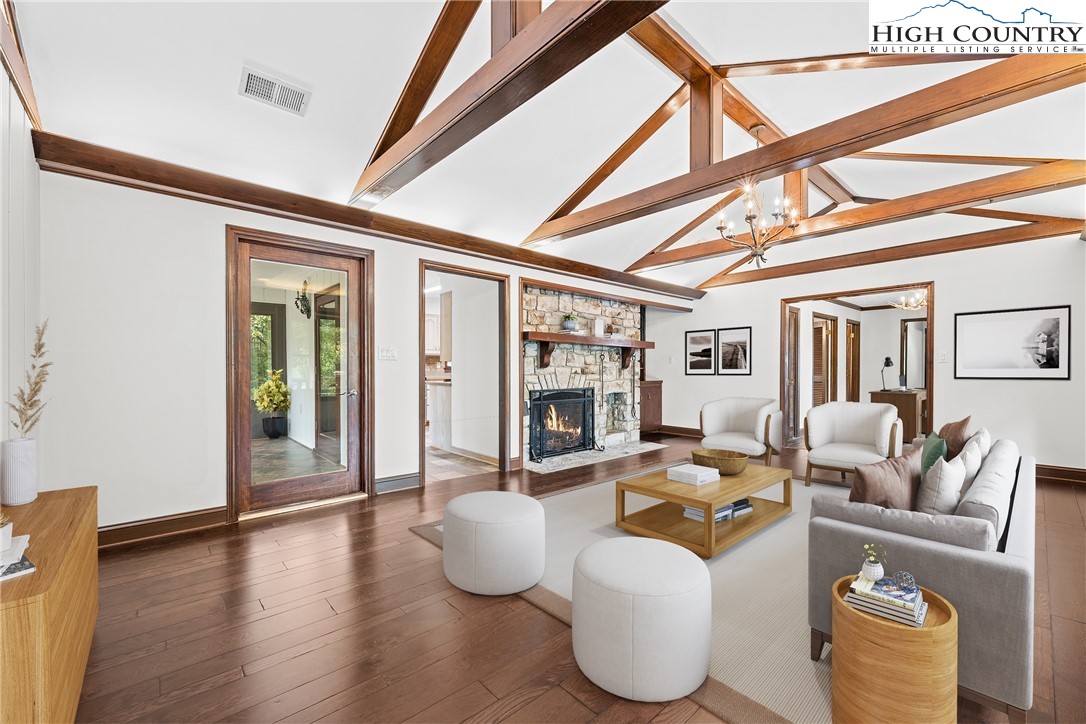 955 Dogwood Boone, NC 28607 - Photo 8 of 48 a living room with furniture and a floor to ceiling window