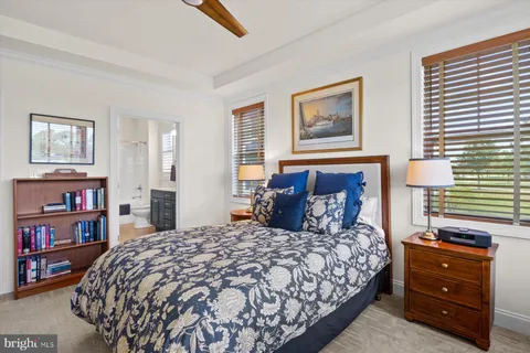 a bedroom with a bed and furniture