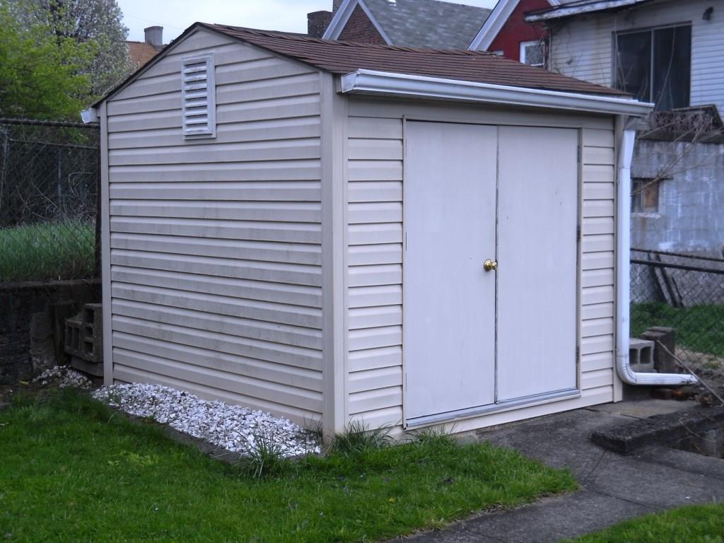 75 McKinnie Avenue McKees Rocks, PA 15136 - Photo 6 of 19 6) Exterior Rear: Storage shed included with property. Property accessible from both McKinnie Ave. in the front & Shaffer Way in the rear.