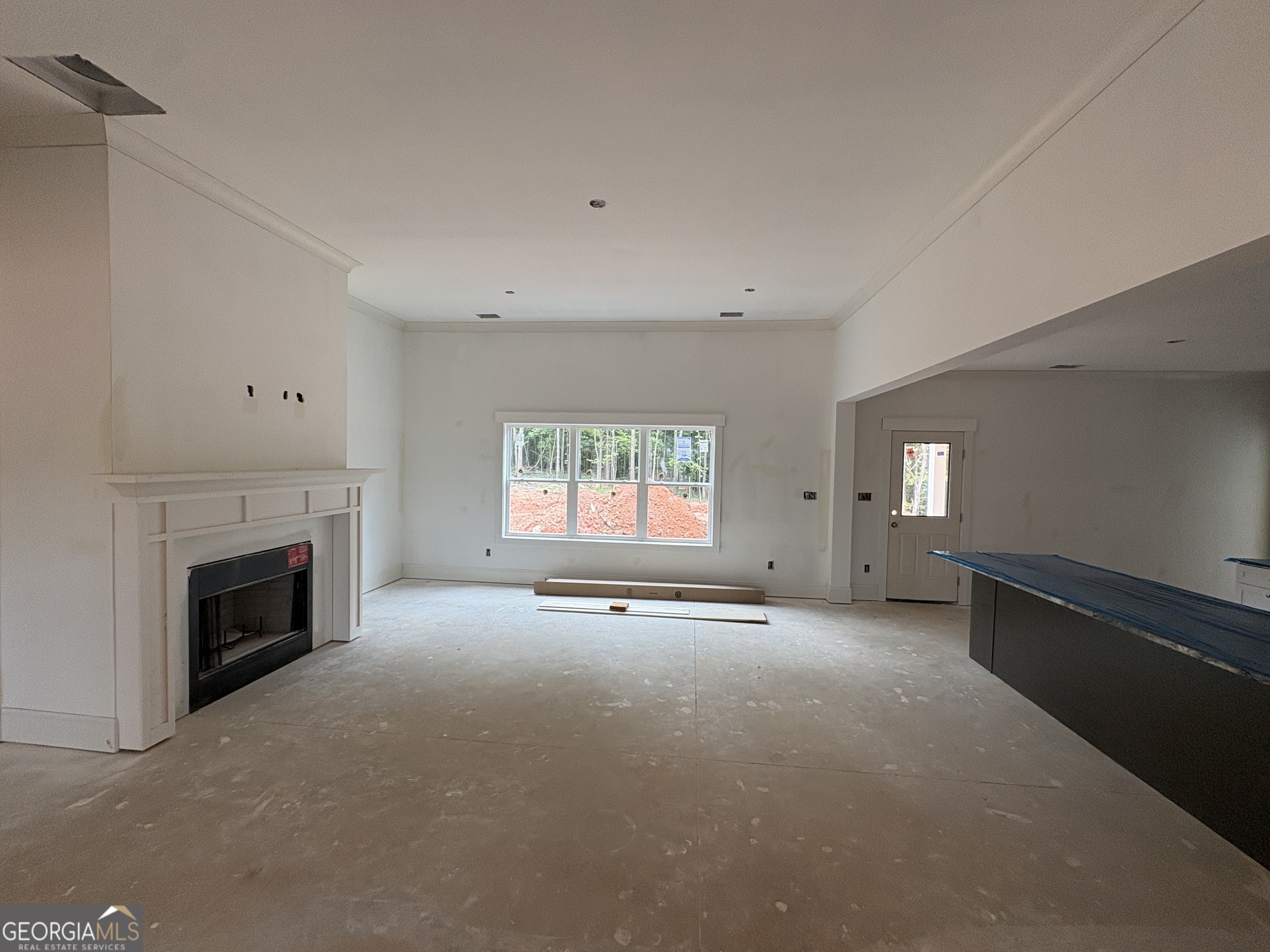 1903 Hoods Mill Road Jefferson, GA 30549 - Photo 2 of 6 a view of empty room with a fireplace