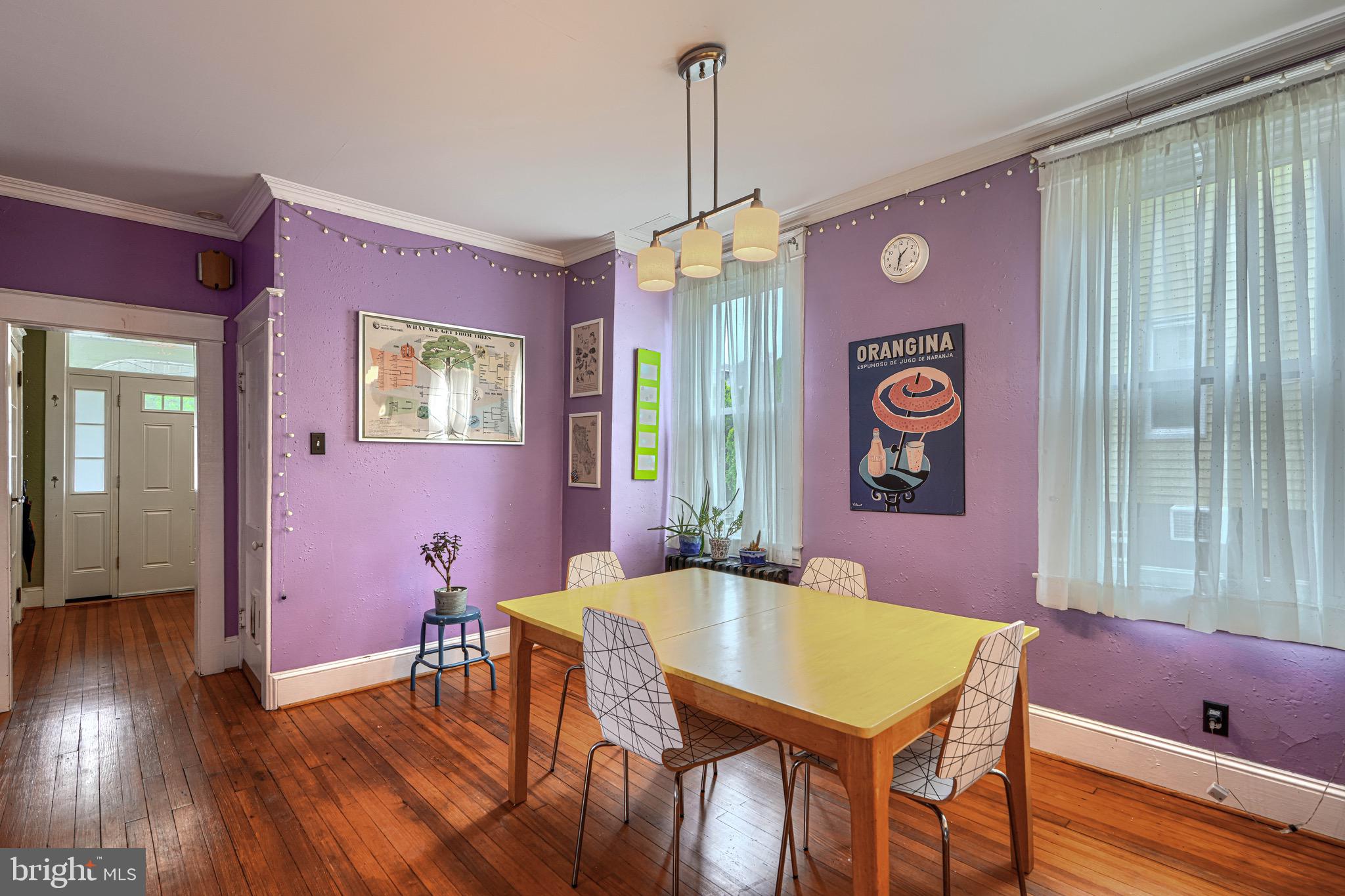 2705 Latona Road Baltimore, MD 21214 - Photo 11 of 53 a dinning table and chairs in a room