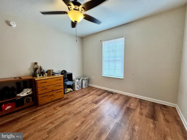 a room with furniture and a window