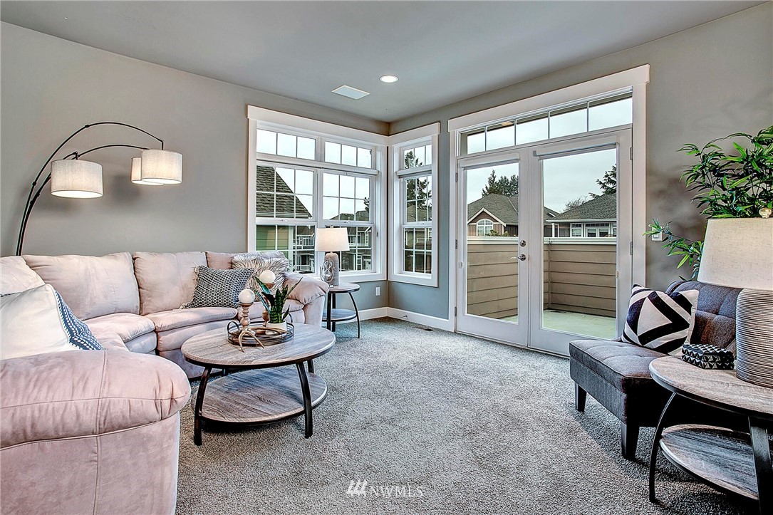 1101 North 27th Place Renton, WA 98056 - Photo 19 of 28 a living room with furniture and a large window