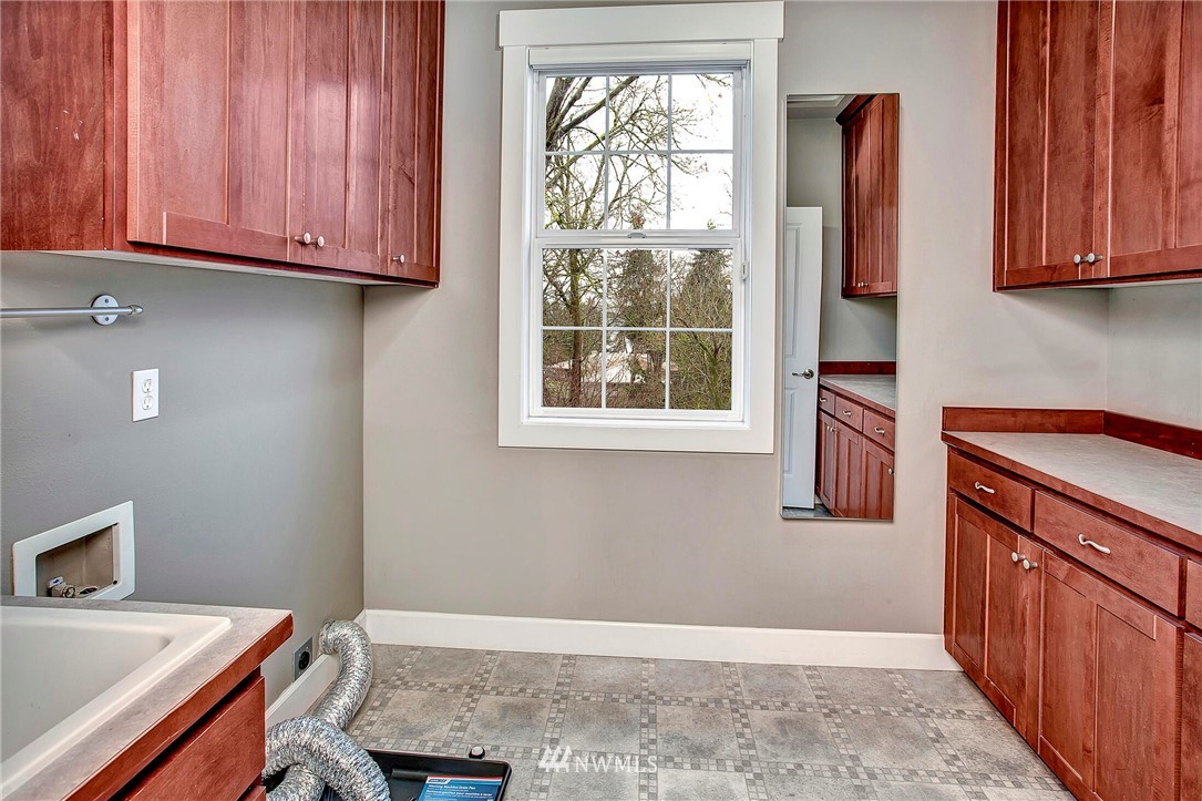 1101 North 27th Place Renton, WA 98056 - Photo 20 of 28 a view of a kitchen with furniture and window
