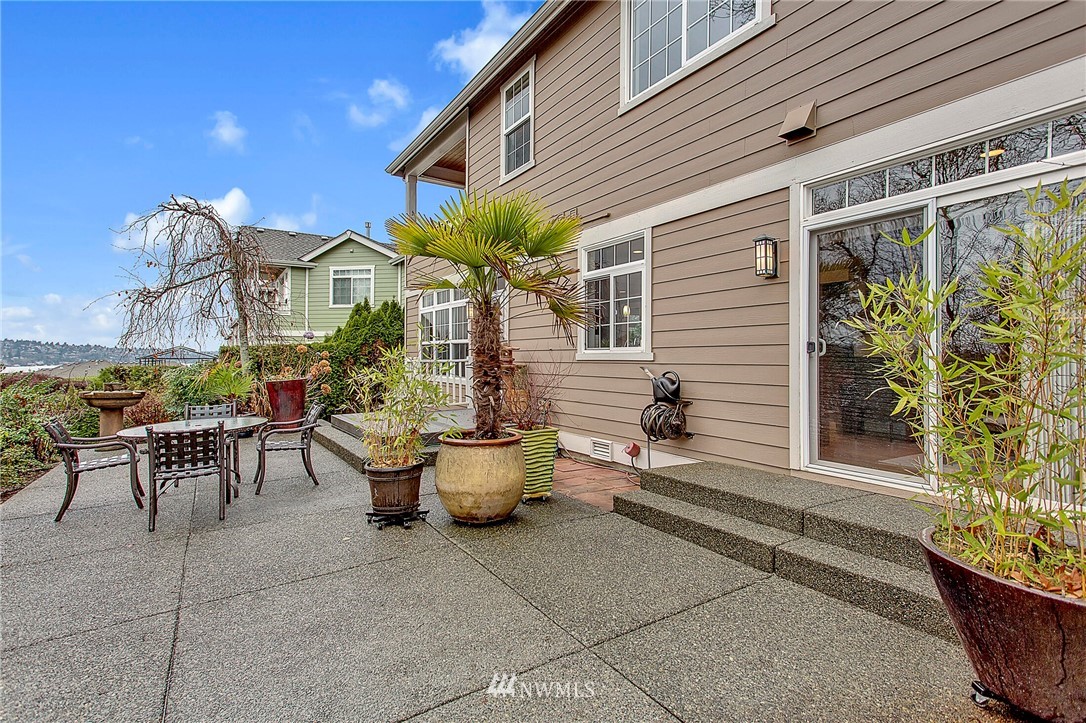 1101 North 27th Place Renton, WA 98056 - Photo 21 of 28 a view of a patio with couches and potted plants