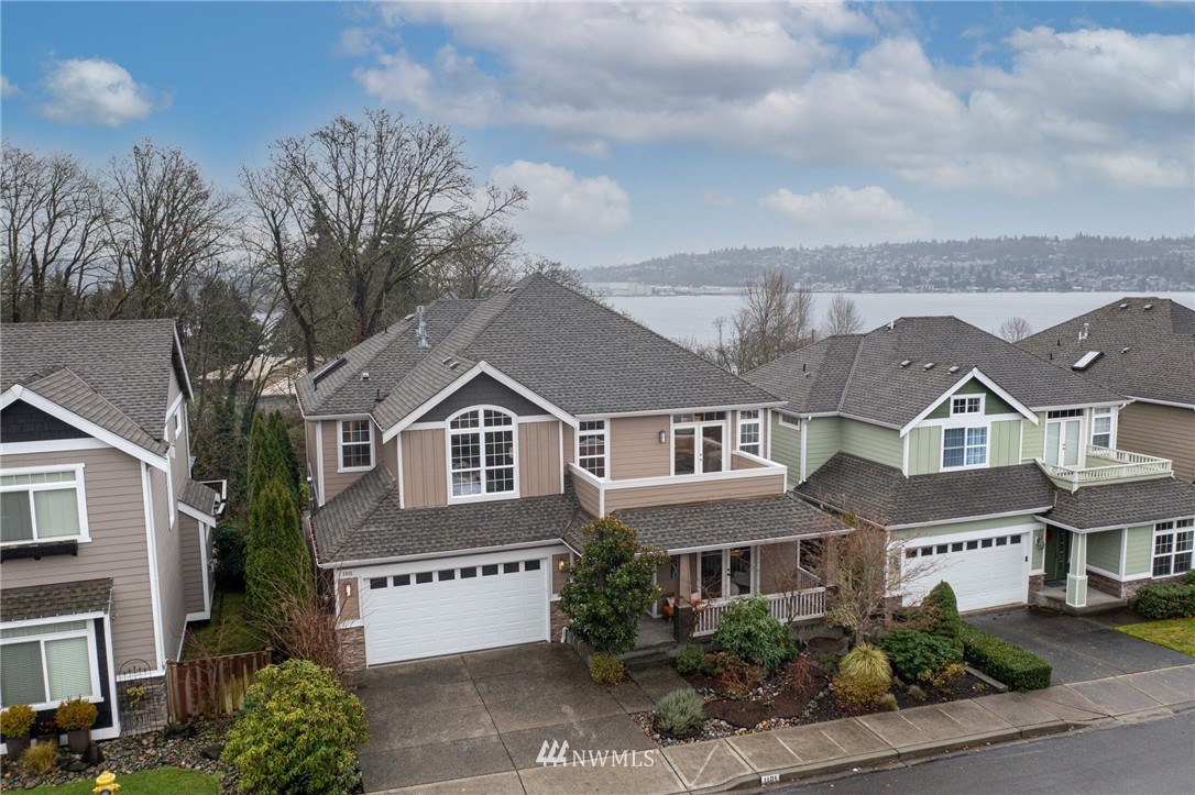 1101 North 27th Place Renton, WA 98056 - Photo 27 of 28 a front view of a house with a garden