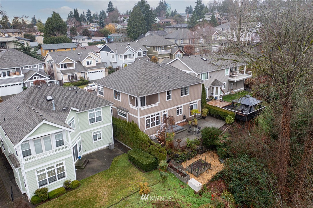 1101 North 27th Place Renton, WA 98056 - Photo 28 of 28 an aerial view of multiple houses with a yard