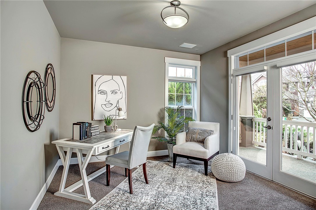 1101 North 27th Place Renton, WA 98056 - Photo 4 of 28 a living room with furniture a window and a potted plant