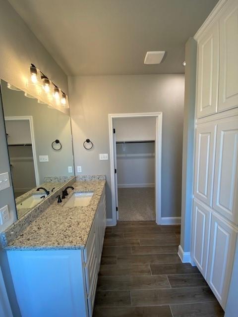 165 Coalson Crossing Azle, TX 76020 - Photo 18 of 23 a bathroom with a granite countertop sink and a mirror