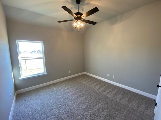 165 Coalson Crossing Azle, TX 76020 - Photo 23 of 23 an empty room with a window and a fan