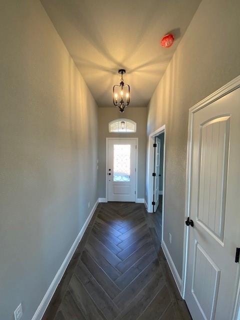 165 Coalson Crossing Azle, TX 76020 - Photo 3 of 23 wooden floor in an empty room with a window