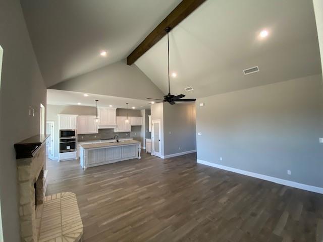 165 Coalson Crossing Azle, TX 76020 - Photo 6 of 23 a view of kitchen and dining room with wooden floor